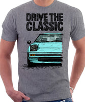 Drive The Classic Mazda RX7 Mk1  Early Model. T-shirt in Heather Grey Colour